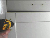 Drill from the front of the door